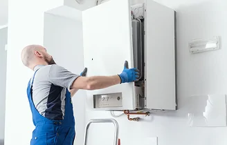 a cool air hvac technician servicing an air conditioner